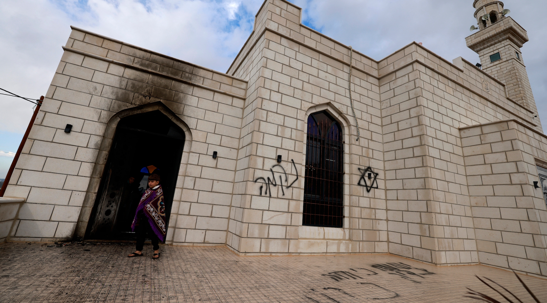 Israel investigating suspected settler attack on West Bank mosque