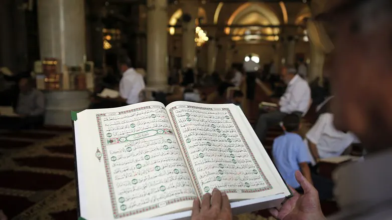 Denmark charges two over desecration of Quran