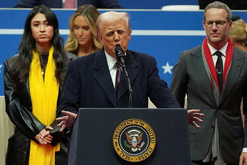 Trump speaks flanked by freed hostages and families of captives