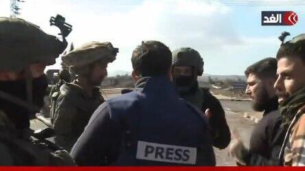 Syrian television crew scuffles with IDF paratroopers in Quneitra