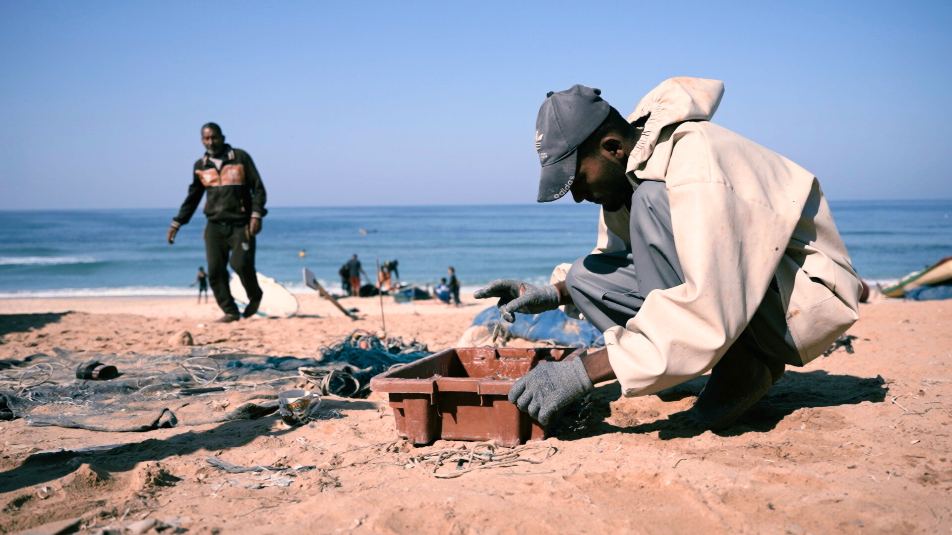 ‘Anyone who goes near the water risks his life. But if we leave the sea, we die’