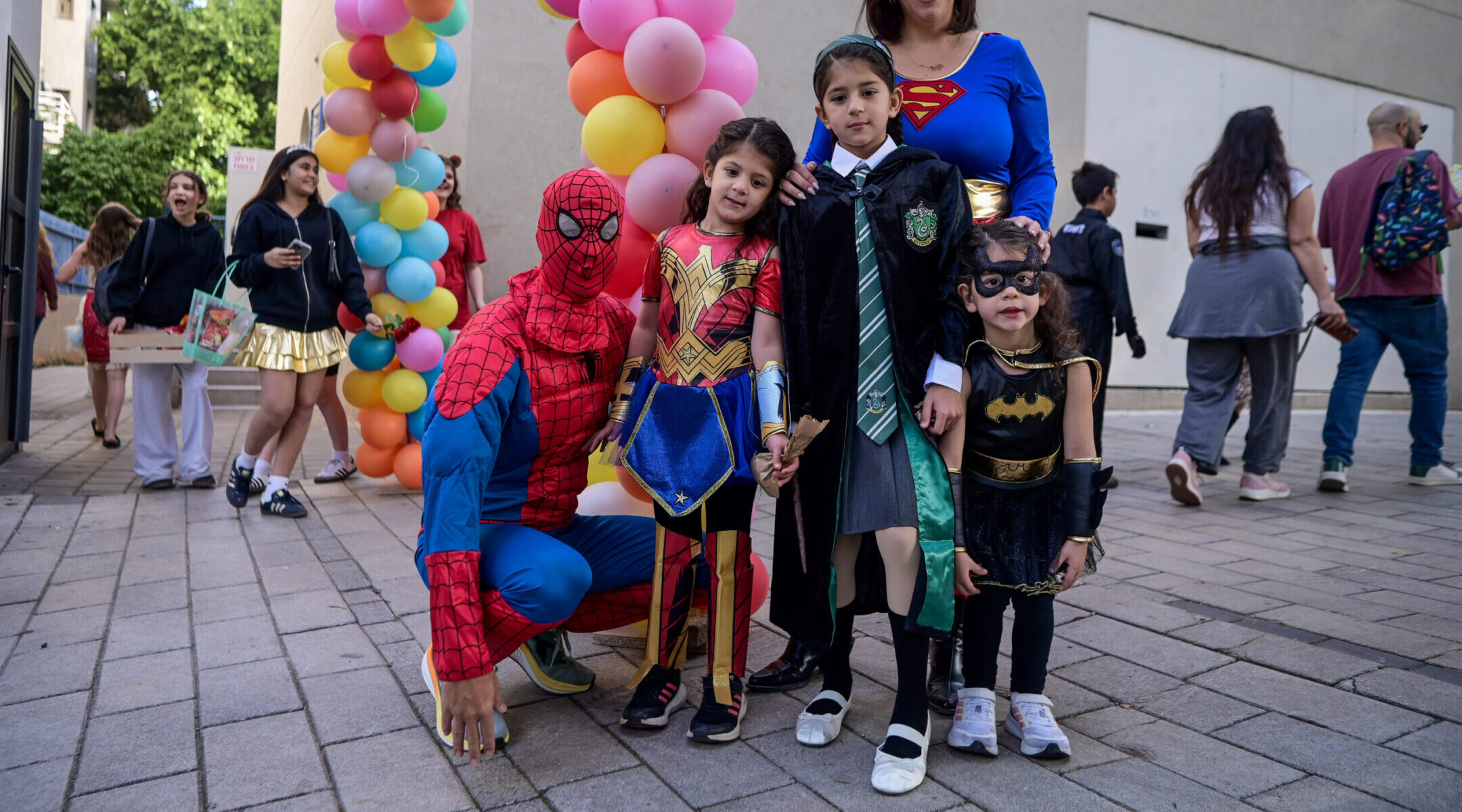 Children in Israel and beyond are dressing as Batman for Purim to honor the slain Bibas brothers