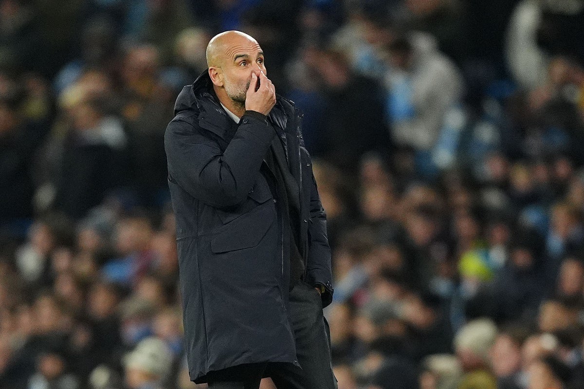 Pep Guardiola holds hands up after much-changed Man City lose in Europe