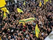 'We'll never surrender our weapons': Thousands mourn Hezbollah military chief killed by Israel 'We'll never surrender our weapons': Thousands mourn Hezbollah military chief killed by Israel