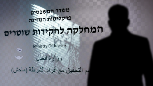 Senior police officer is suspected of trying to influence case not yet public and is