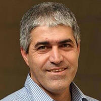 Car fire in Haifa spreads to residential building; four people, including infant, res