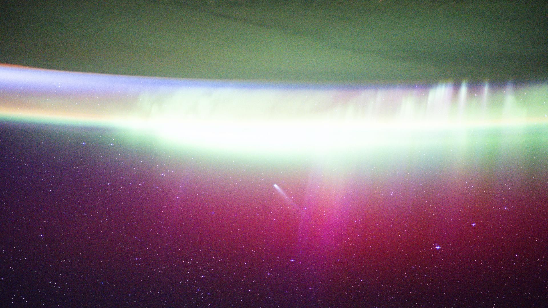 ISS astronauts see comet Lemmon ‘absorbed’ by aurora photo of the day for Nov. 20, 2025