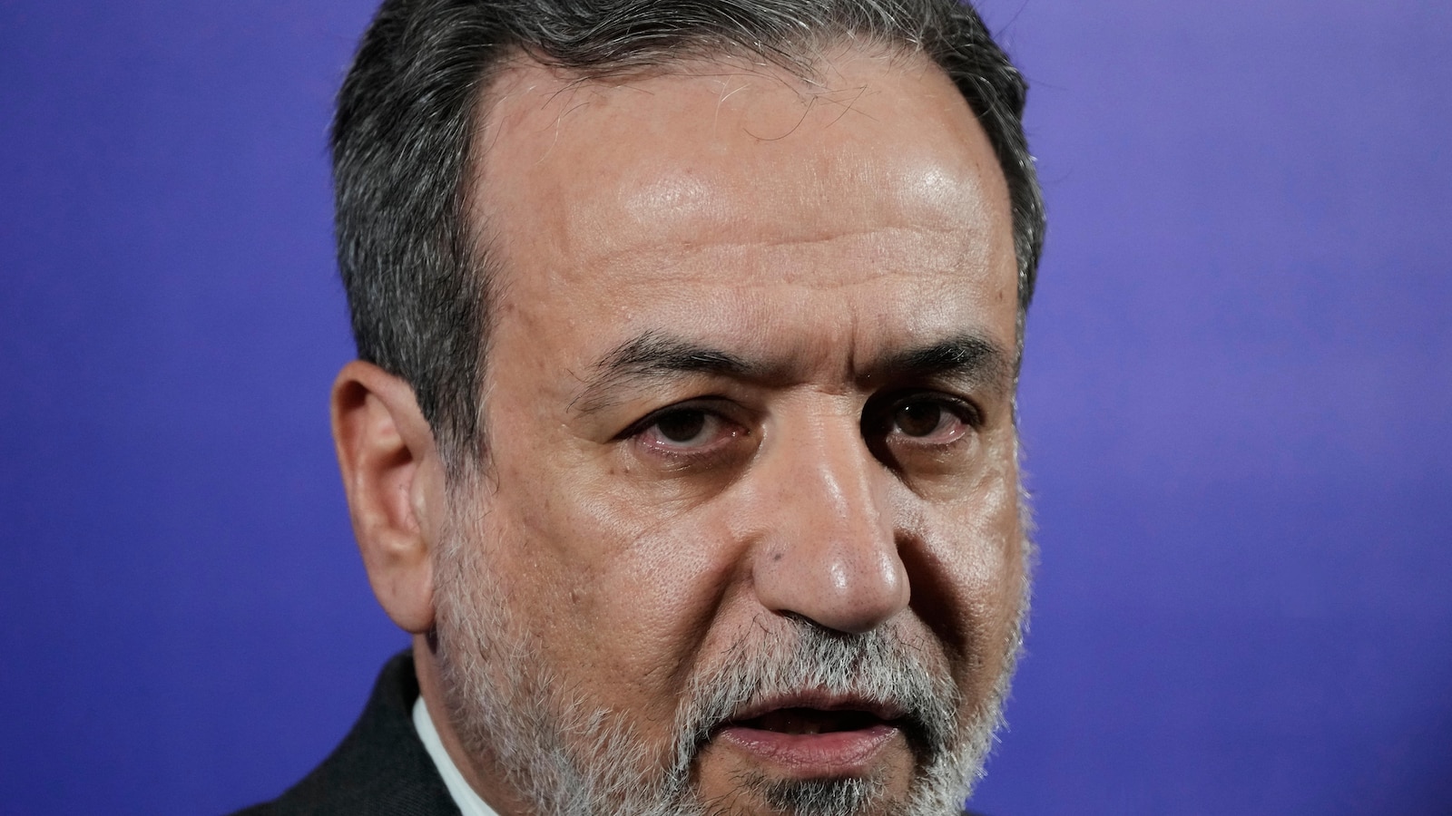 Foreign minister says Iran is no longer enriching uranium at any site in the country