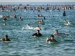 Hundreds of Surfers and Swimmers Paddle Out From Bondi Beach in Tribute to Antisemitic Mass Shooting Victims
