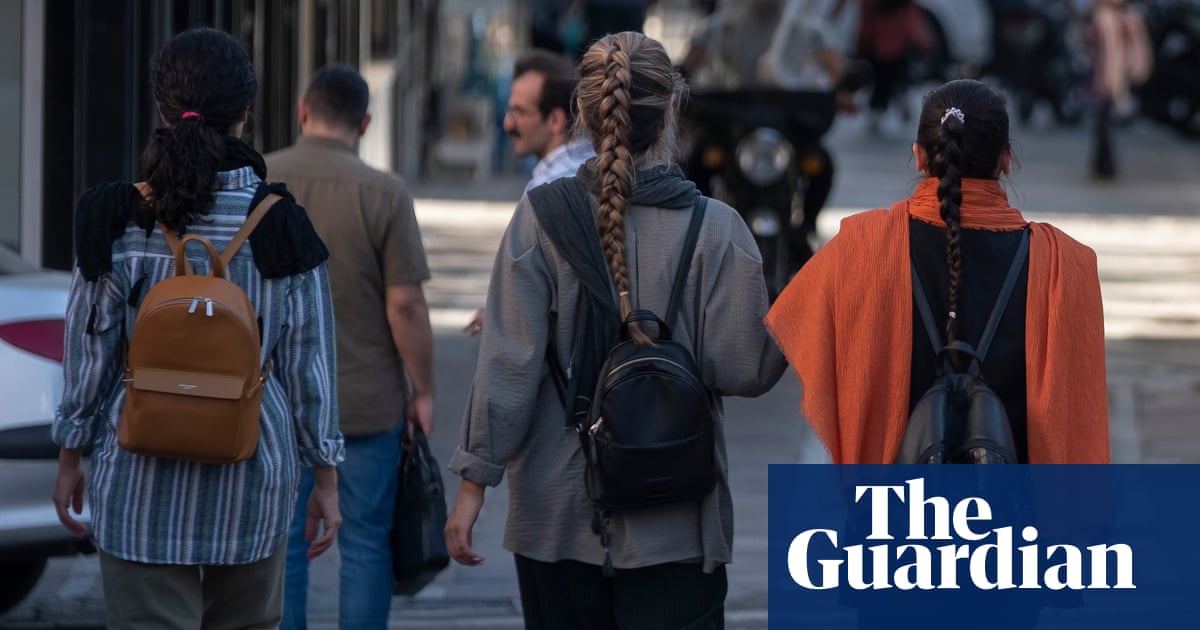 Two marathon organisers arrested in Iran over women running without hijabs | Iran Two marathon organisers arrested in Iran over women running without hijabs | Iran