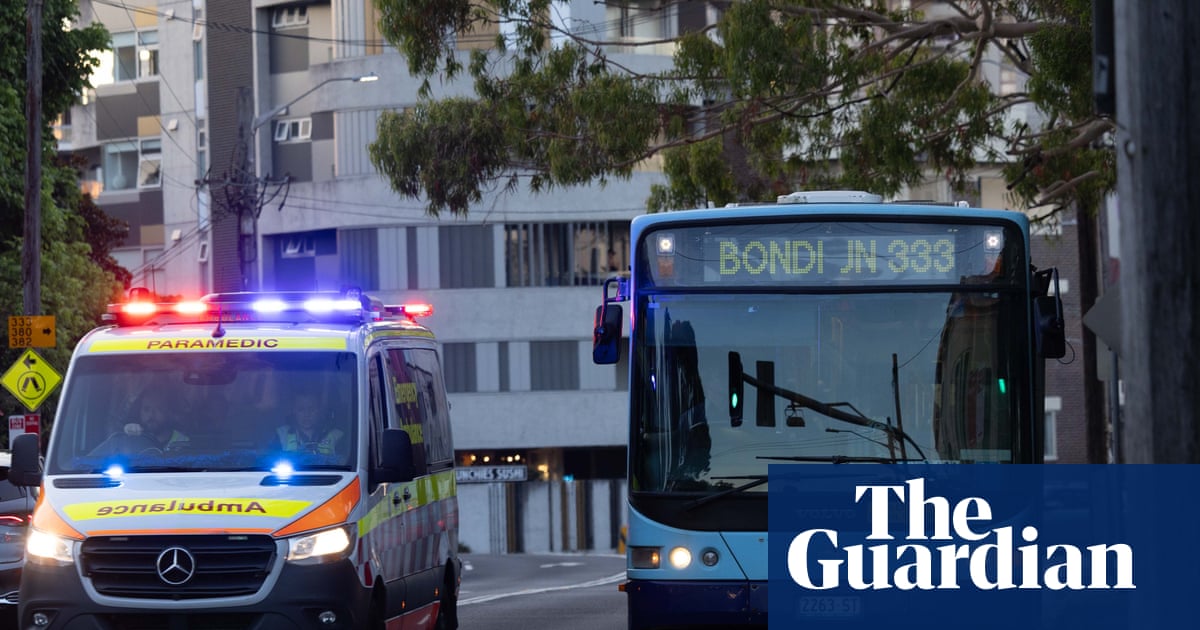 Bondi beach mass shooting: NSW police advise people to ‘take shelter’ with two in custody | Bondi
