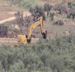 Occupation forces uproot around 400 olive trees, level 35 dunums in village west of Ramallah Occupation forces uproot around 400 olive trees, level 35 dunums in village west of Ramallah
