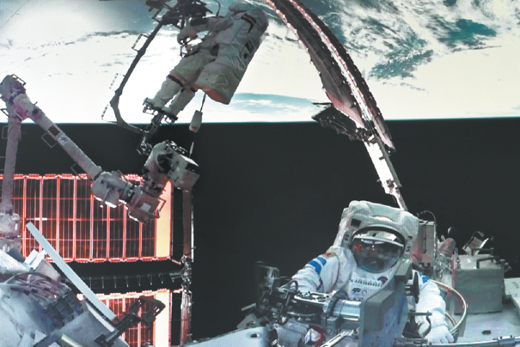 Shenzhou XXI astronauts conduct first spacewalk, install debris shields Shenzhou XXI astronauts conduct first spacewalk, install debris shields