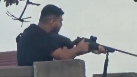 Sydney attackers radicalized at mosque, carried ISIS flag; new footage emerges near m Sydney attackers radicalized at mosque, carried ISIS flag; new footage emerges near m