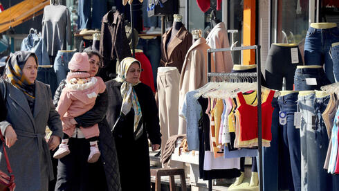 Partial shutdown in Tehran as Iran appoints new bank governor and warns protesters of