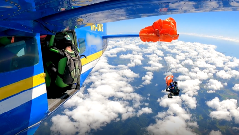 skydiver left hanging from plane wing after sudden parachute d skydiver left hanging from plane wing after sudden parachute d