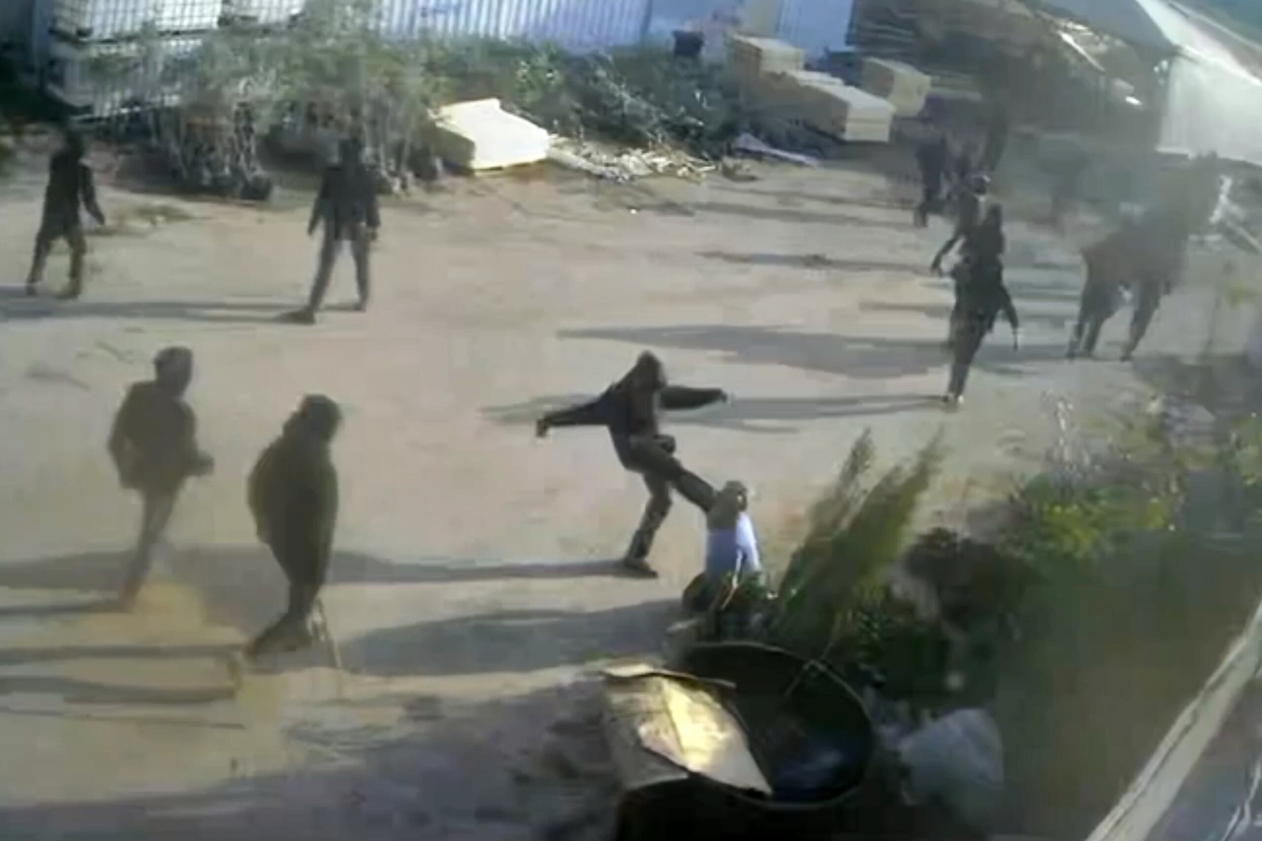 Video shows armed men beating a Palestinian in the Israeli-occupied West Bank