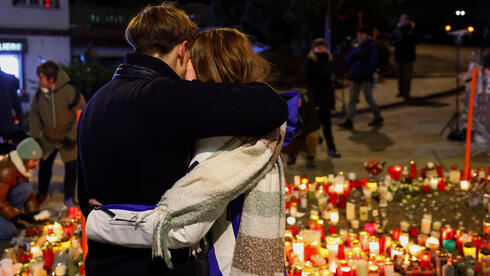 Families await news after New Year’s Eve fire in Swiss ski res