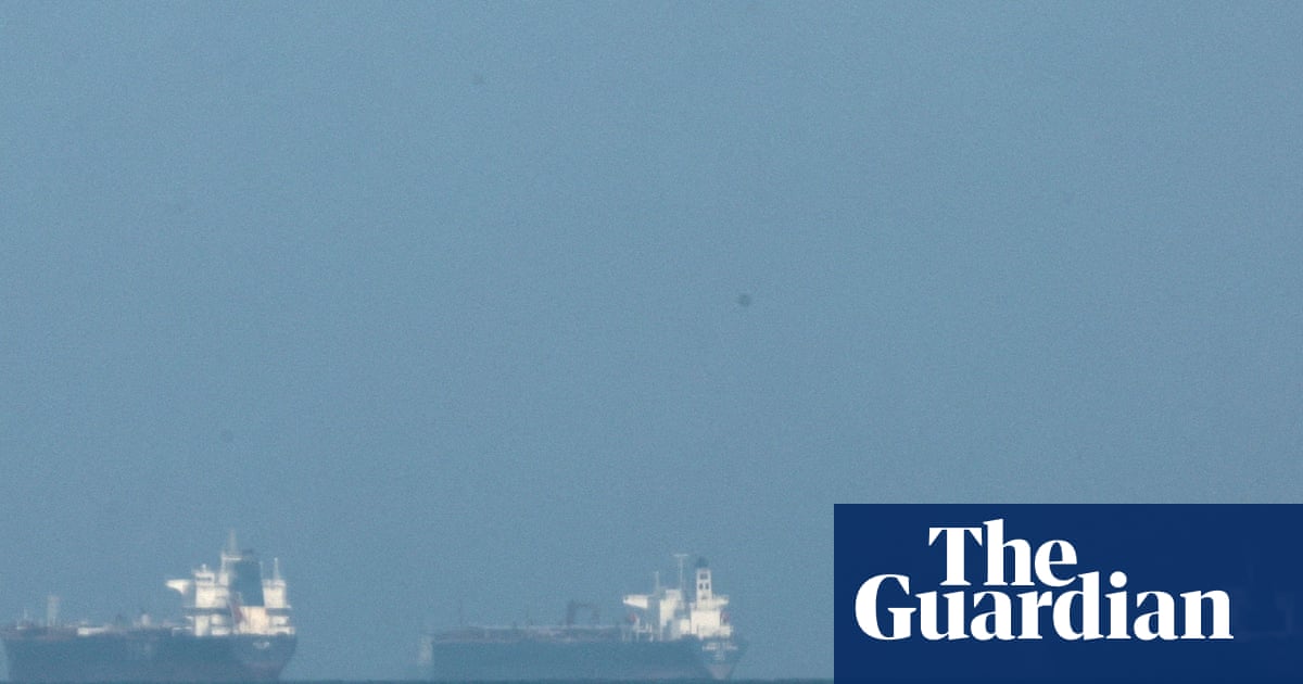 ‘We’re powerless … and hoping nothing hits us’: trapped on a tanker as Iran war escalates | Shipping industry