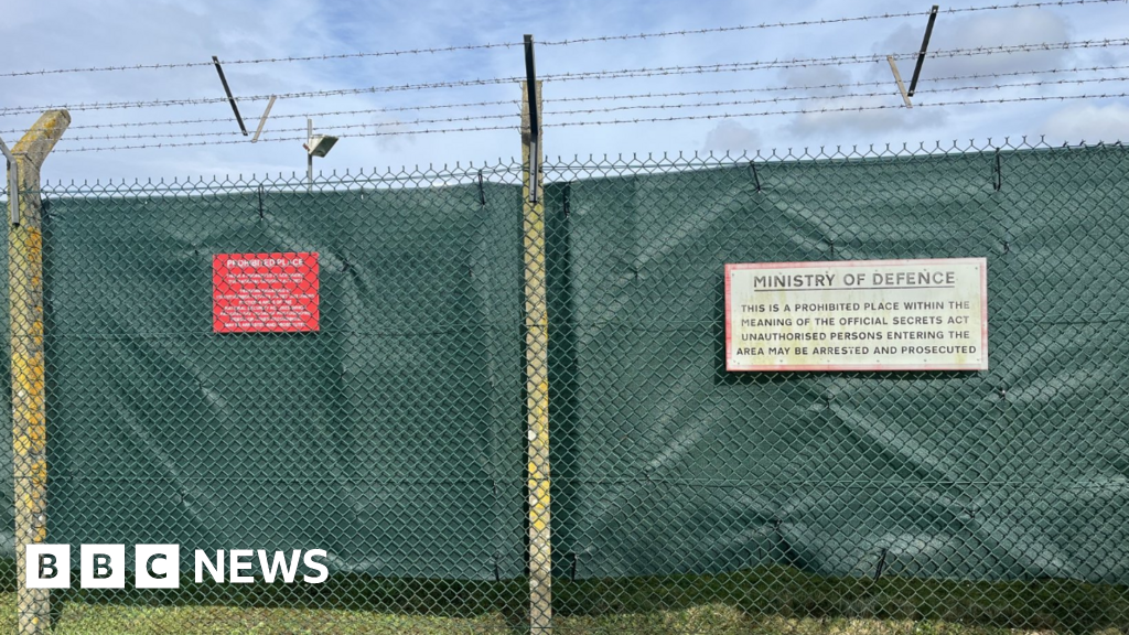 Roads closed and screens put up around RAF base – BBC