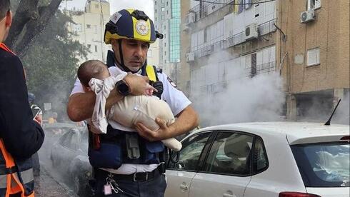 After lull, Iranian cluster missile wounds 10 in central Israel