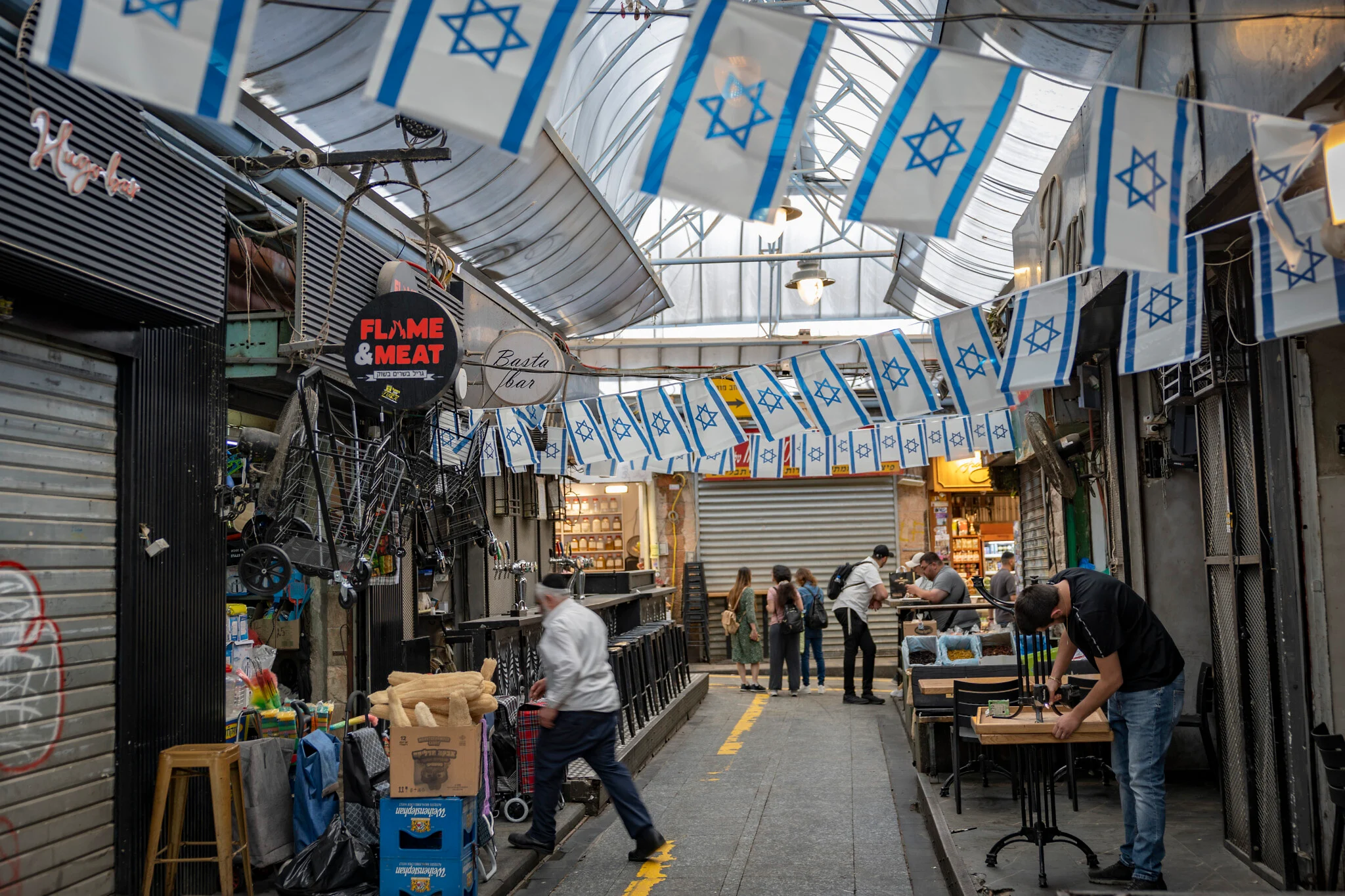 A week into Iran ceasefire, Israelis try to snap back as expected, but fear return to war