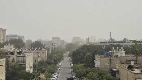 Dust cloud blankets Israel as haze, hail and rain hit parts of country