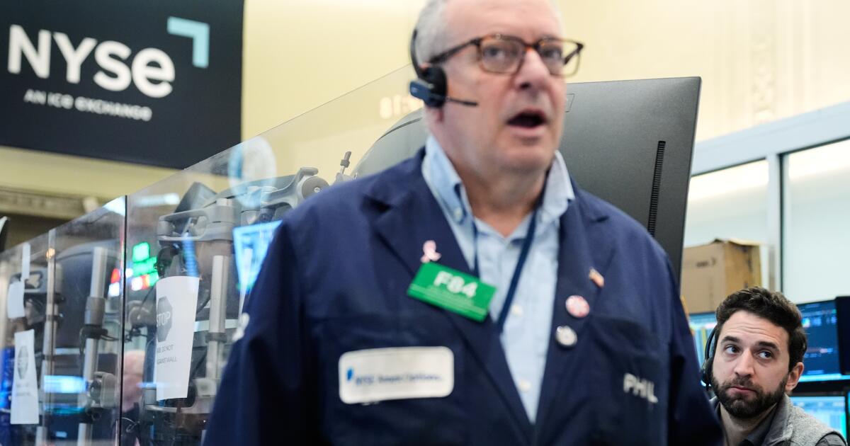 Wall Street rallies to the edge of its all-time high as oil prices ease